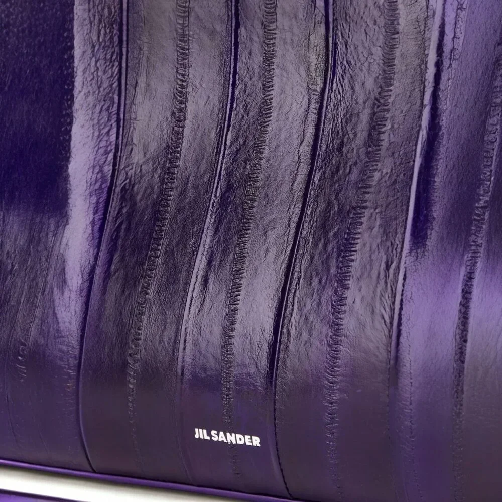 Jil Sander experience height